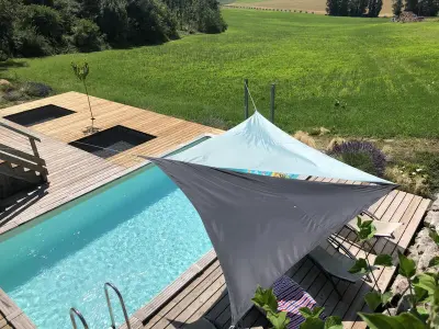 Gite à Montagrier,Maison en bois avec piscine privée chauffée, terrasse et jardin - Ideal famille et nature FR-1-616-96 N°839386