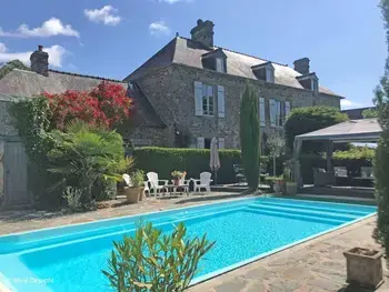 Gîte in Rives d'Andaine,Gîte tout confort avec piscine chauffée, jardin et terrasse, idéal pour curistes et randonneurs FR-1-497-199 N°997459