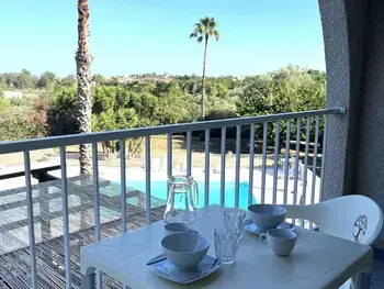 Appartement à Saint Florent,Studio à Saint-Florent avec piscine, climatisation, balcon et parking, proche plage et centre FR-1-650-36 N°1012180