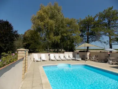 Gite à Angeduc,Gîte spacieux avec piscine chauffée, jardin, WIFI et animaux admis FR-1-653-273 N°1039417